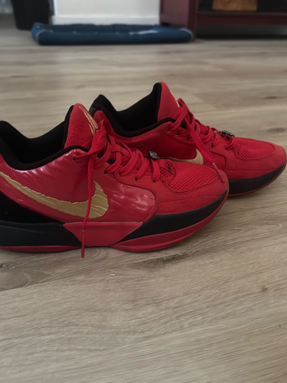 Nike Kids Red Sneakers with Gold Swoosh